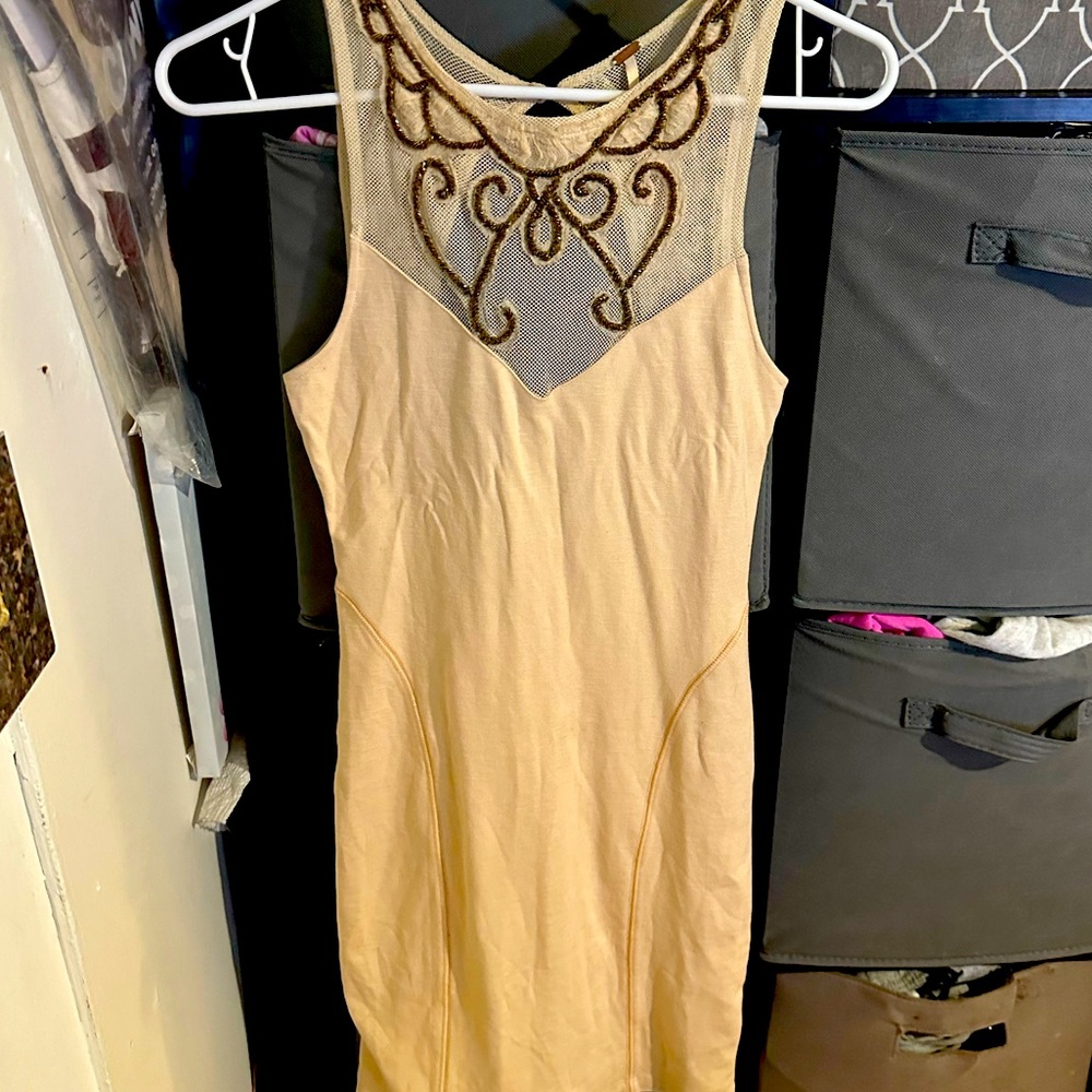 Beautiful xs free people dress. Never worn. Mesh details